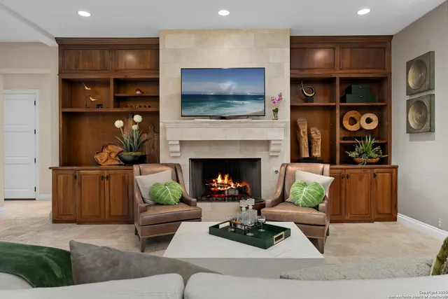 a view of a hallway with couch and chandelier
