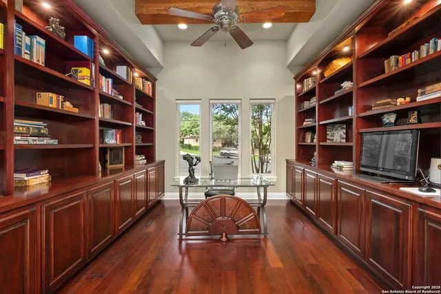 a bedroom with a bed and a table in it