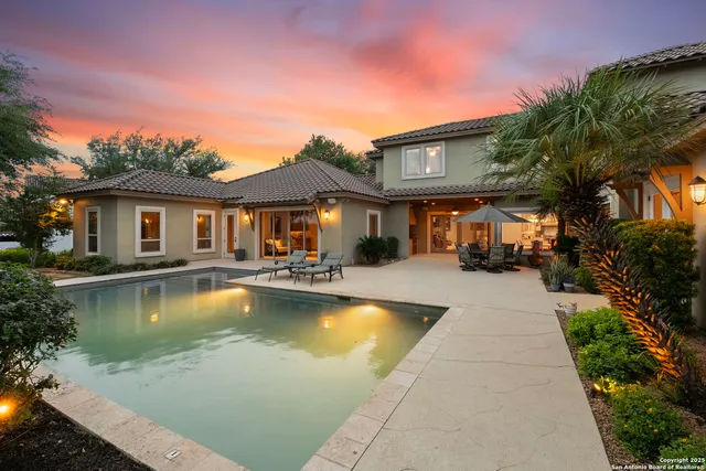 front view of a house with swimming pool