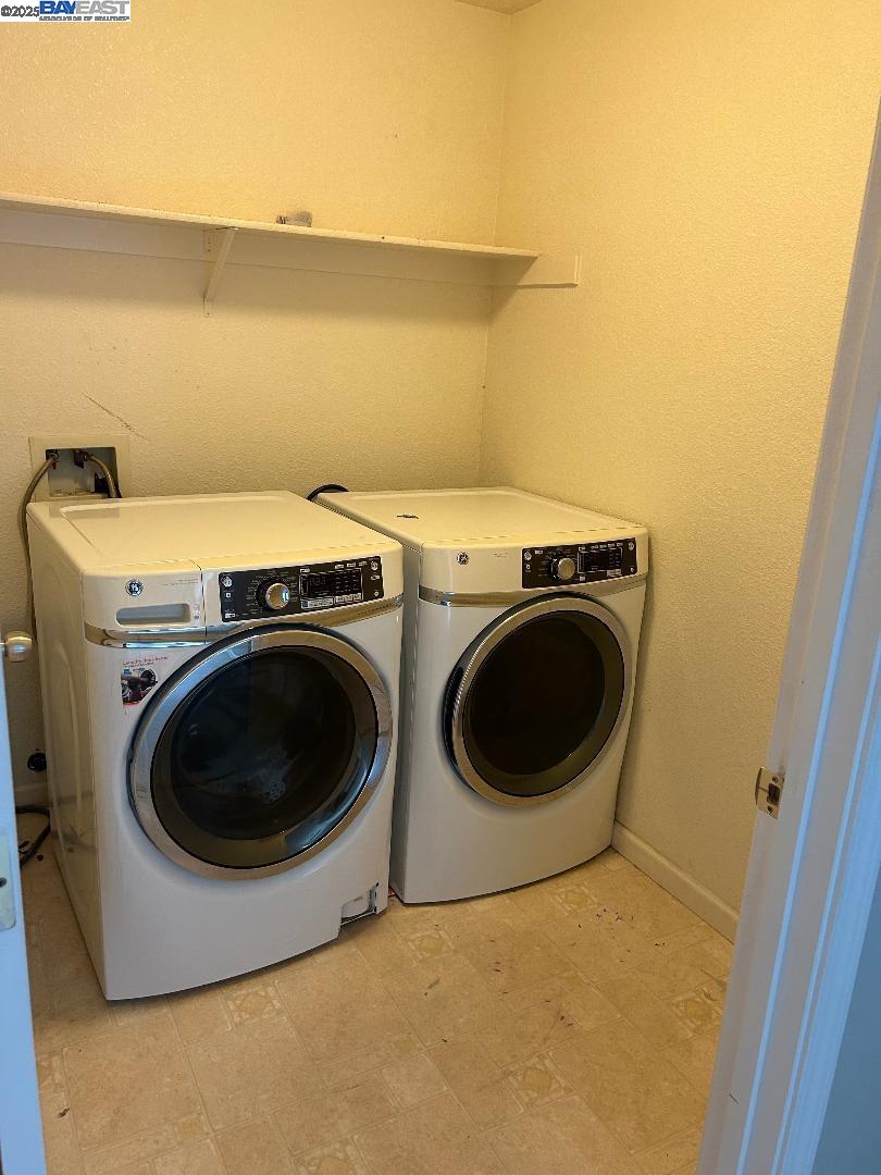 112 Gibson Avenue Bay Point, CA 94565 - Photo 16 of 19 a utility room with dryer and washer