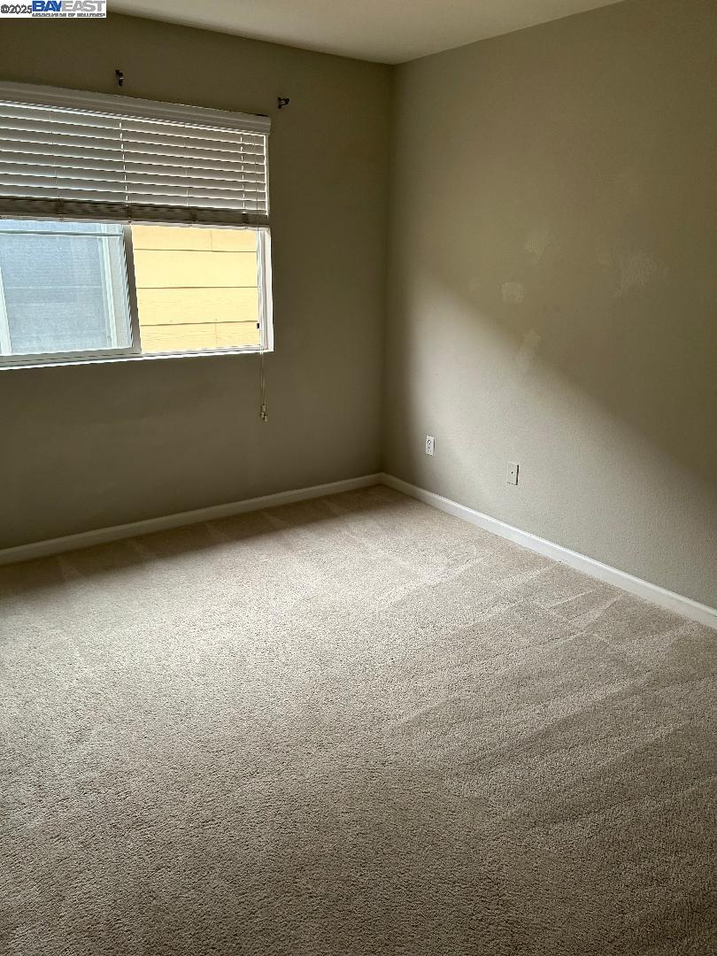 112 Gibson Avenue Bay Point, CA 94565 - Photo 8 of 19 an empty room with a window