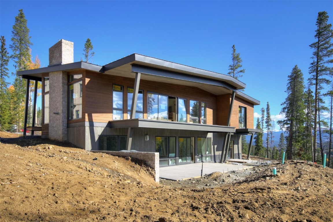 233 Barton Ridge Drive Breckenridge, CO 80424 - Photo 1 of 13 a front view of a house with a yard