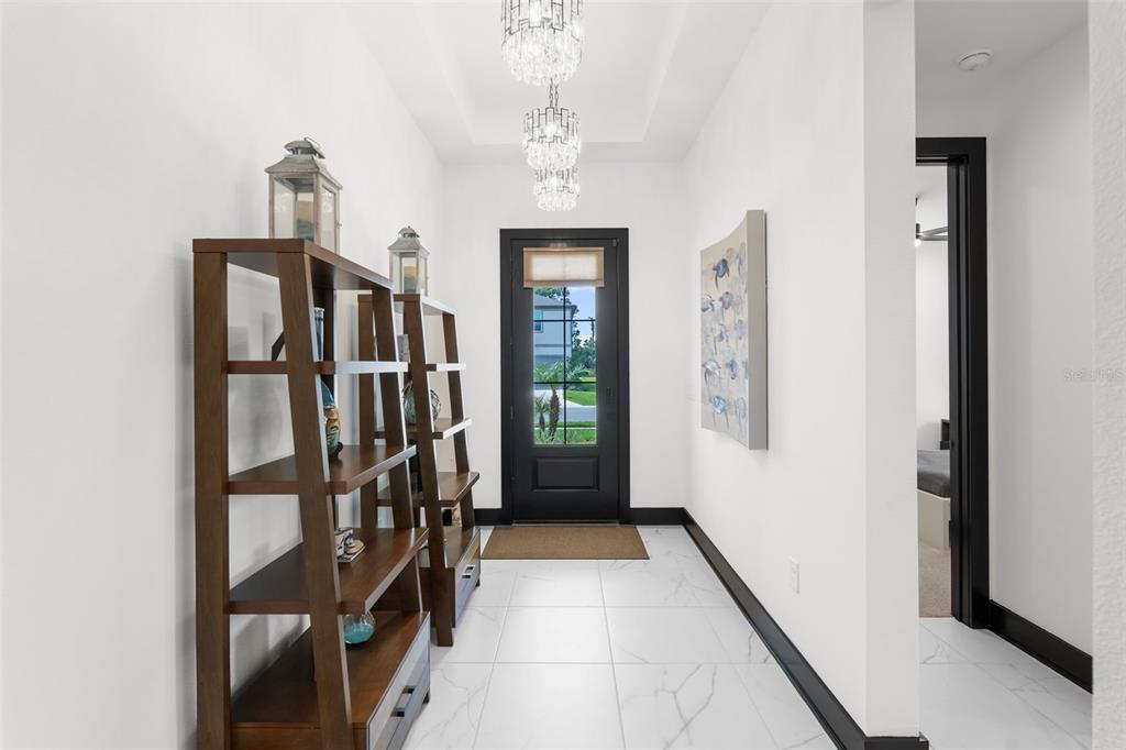 8756 Windlass Cove Palmetto, FL 34221 - Photo 13 of 50 a view of entryway with livingroom