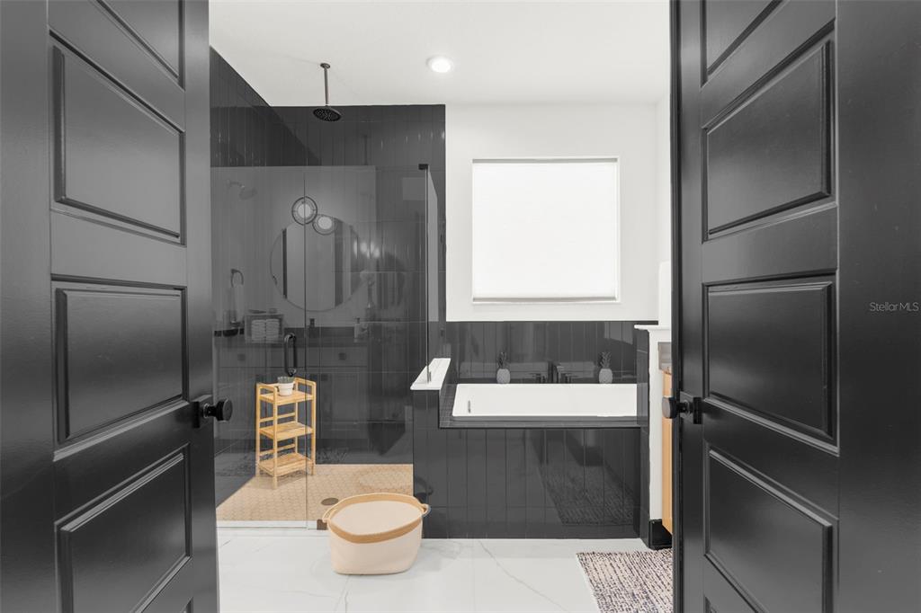 8756 Windlass Cove Palmetto, FL 34221 - Photo 39 of 50 a bathroom with a toilet sink and mirror