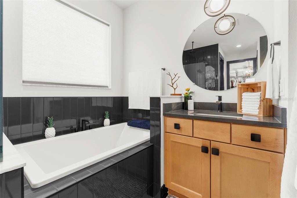 8756 Windlass Cove Palmetto, FL 34221 - Photo 40 of 50 a kitchen with a sink and a mirror