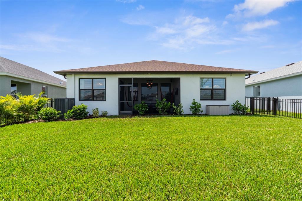 8756 Windlass Cove Palmetto, FL 34221 - Photo 8 of 50 a front view of house with yard and green space