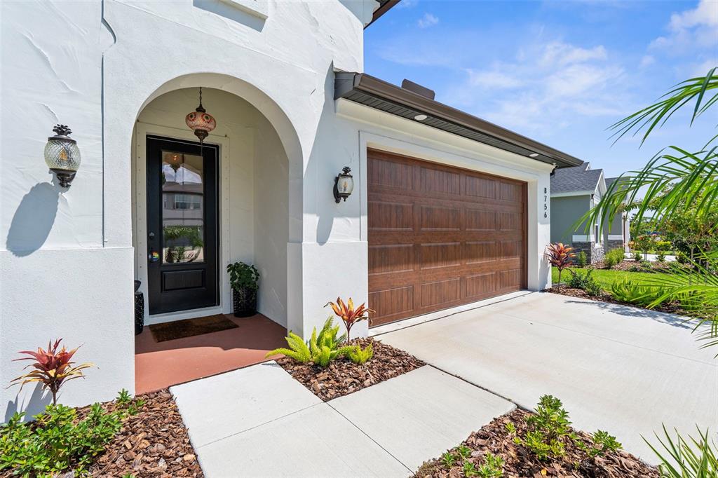 8756 Windlass Cove Palmetto, FL 34221 - Photo 10 of 50 a front view of a house