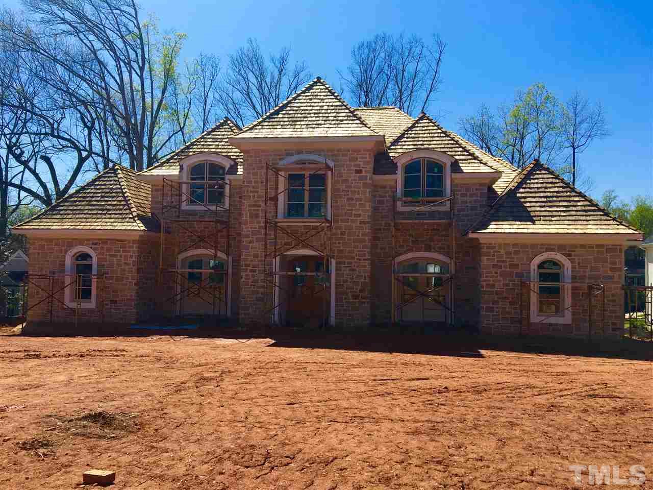 3133 Sussex Road Raleigh, NC 27607 - Photo 1 of 5 a front view of a house with a yard