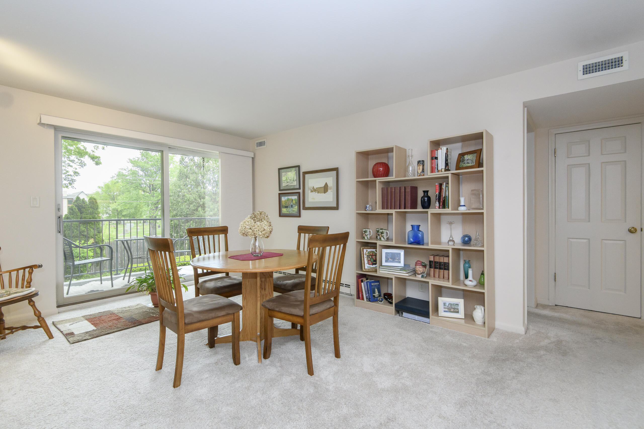 13335 Watertown Plank Road, Unit 109 Elm Grove, WI 53122 - Photo 2 of 25 Comfortable living indoors and out