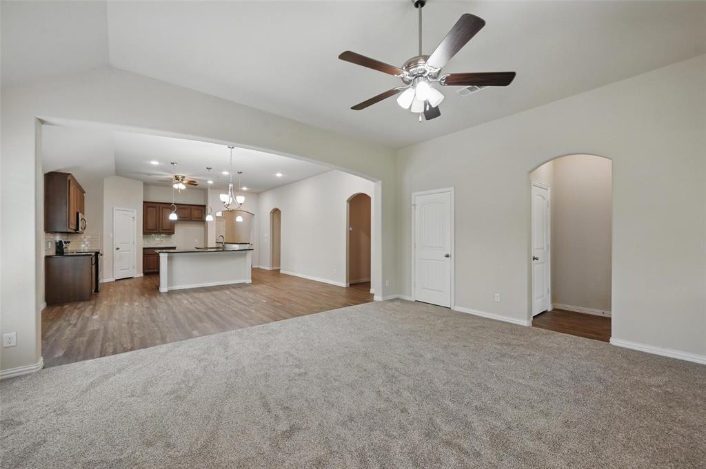 512 Hidden Spgs Trail Azle, TX 76020 - Photo 11 of 27 a view of a livingroom with a flat screen tv