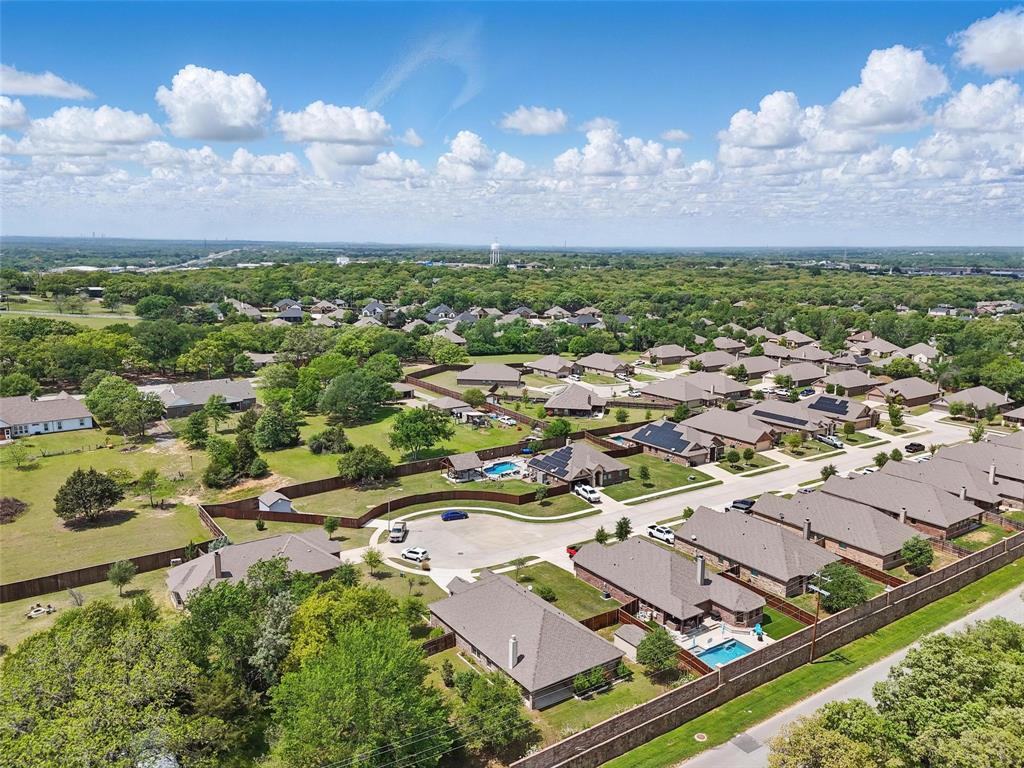 512 Hidden Spgs Trail Azle, TX 76020 - Photo 24 of 27 an aerial view of residential houses with outdoor space