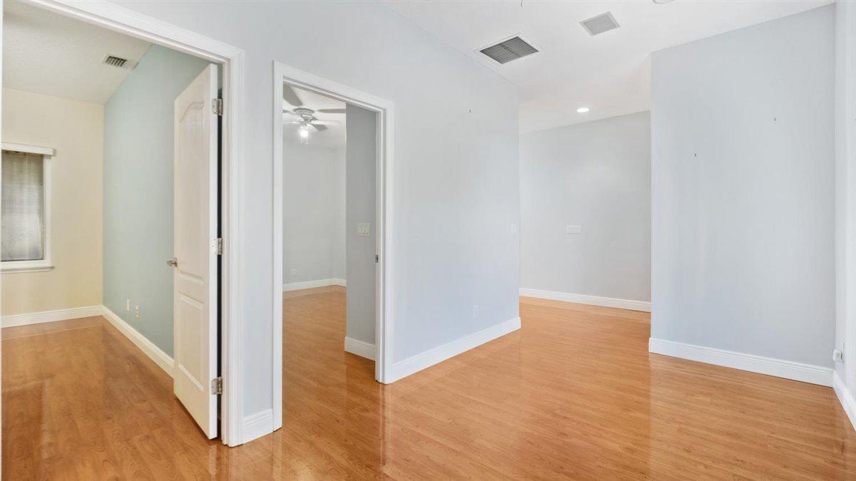 739 Seymour Road Northeast Palm Bay, FL 32905 - Photo 19 of 25 Guest Bedroom Hallway