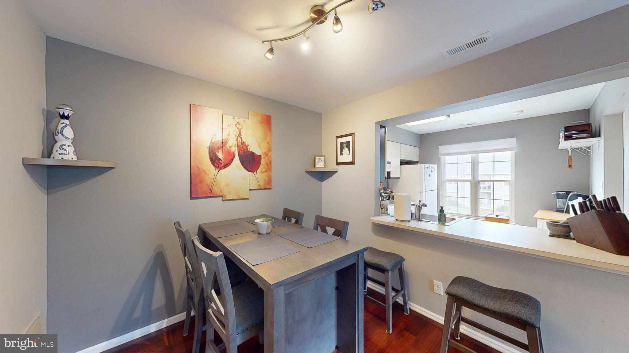 1008 B Ralston Drive Mount Laurel, NJ 08054 - Photo 10 of 29 a view of a dining room with furniture and window