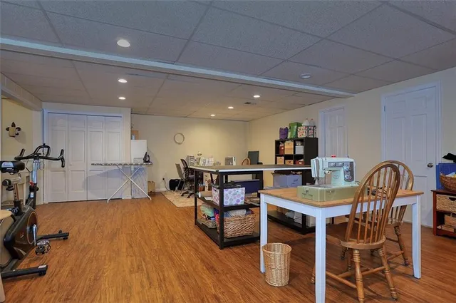 a view of a workspace with furniture