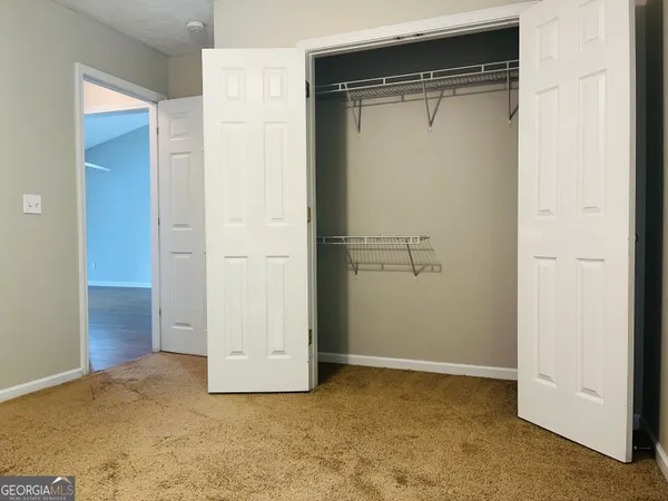 an empty room with closet