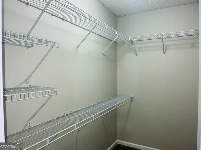 a view of a room with rack on the wall