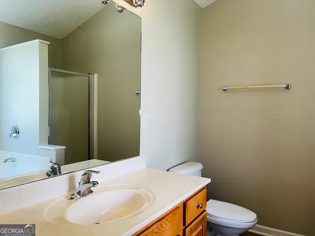a bathroom with a sink and a toilet