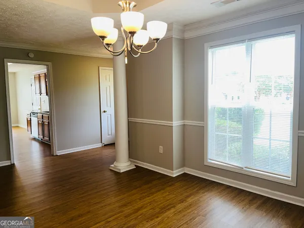 a view of livingroom with wooden floor