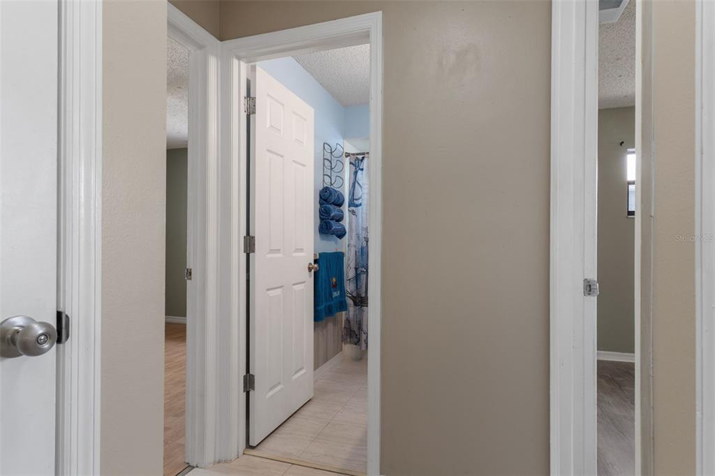 2481 South Summerwood Point Inverness, FL 34450 - Photo 27 of 38 a view of a bathroom from a hallway