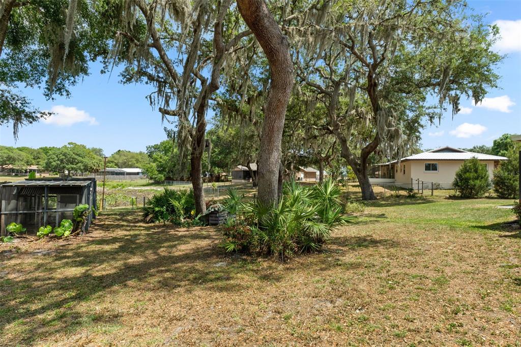 2481 South Summerwood Point Inverness, FL 34450 - Photo 37 of 38 a view of a house with backyard and sitting area