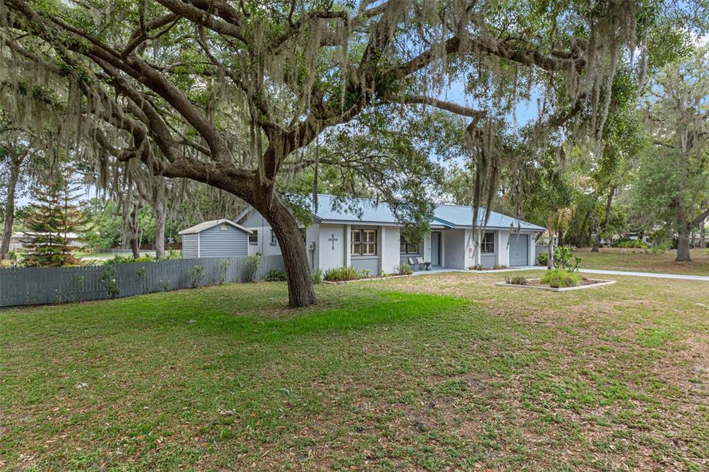 2481 South Summerwood Point Inverness, FL 34450 - Photo 6 of 38 a view of a house with a yard
