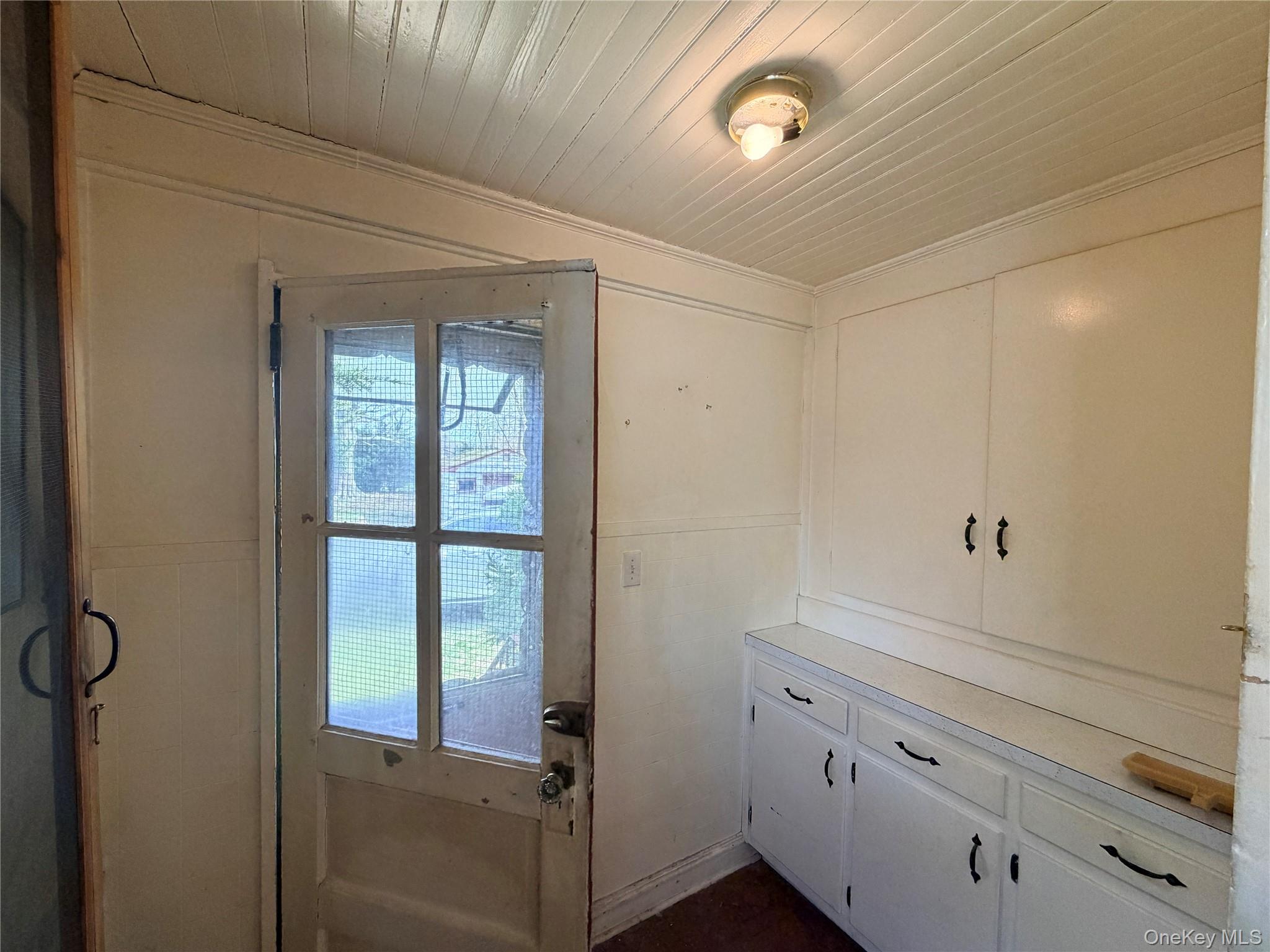 245 Woodbury Road Hicksville, NY 11801 - Photo 9 of 37 a bathroom with a shower and a window