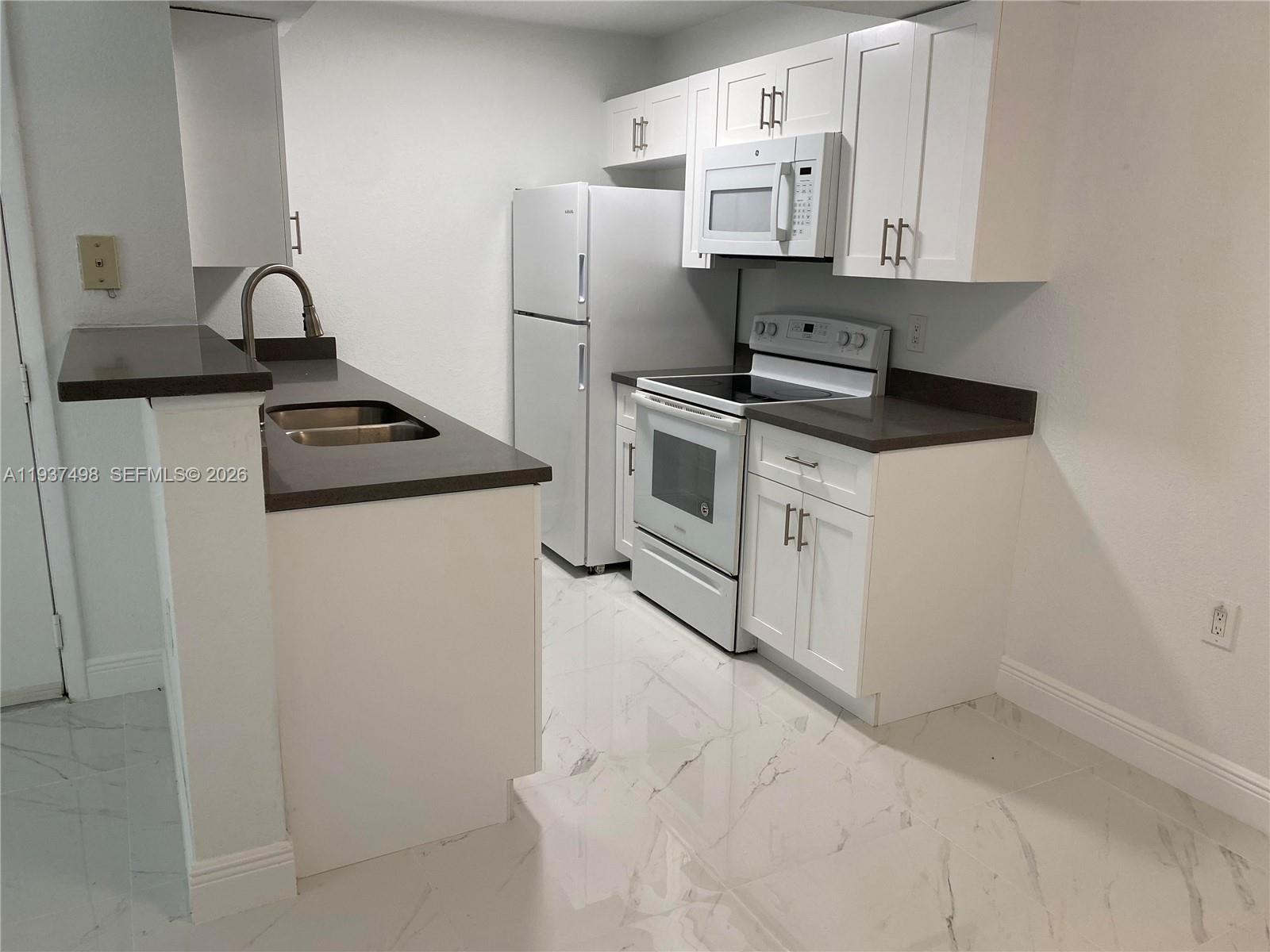 15560 Southwest 104th Terrace, Unit 619 Miami, FL 33196 - Photo 2 of 29