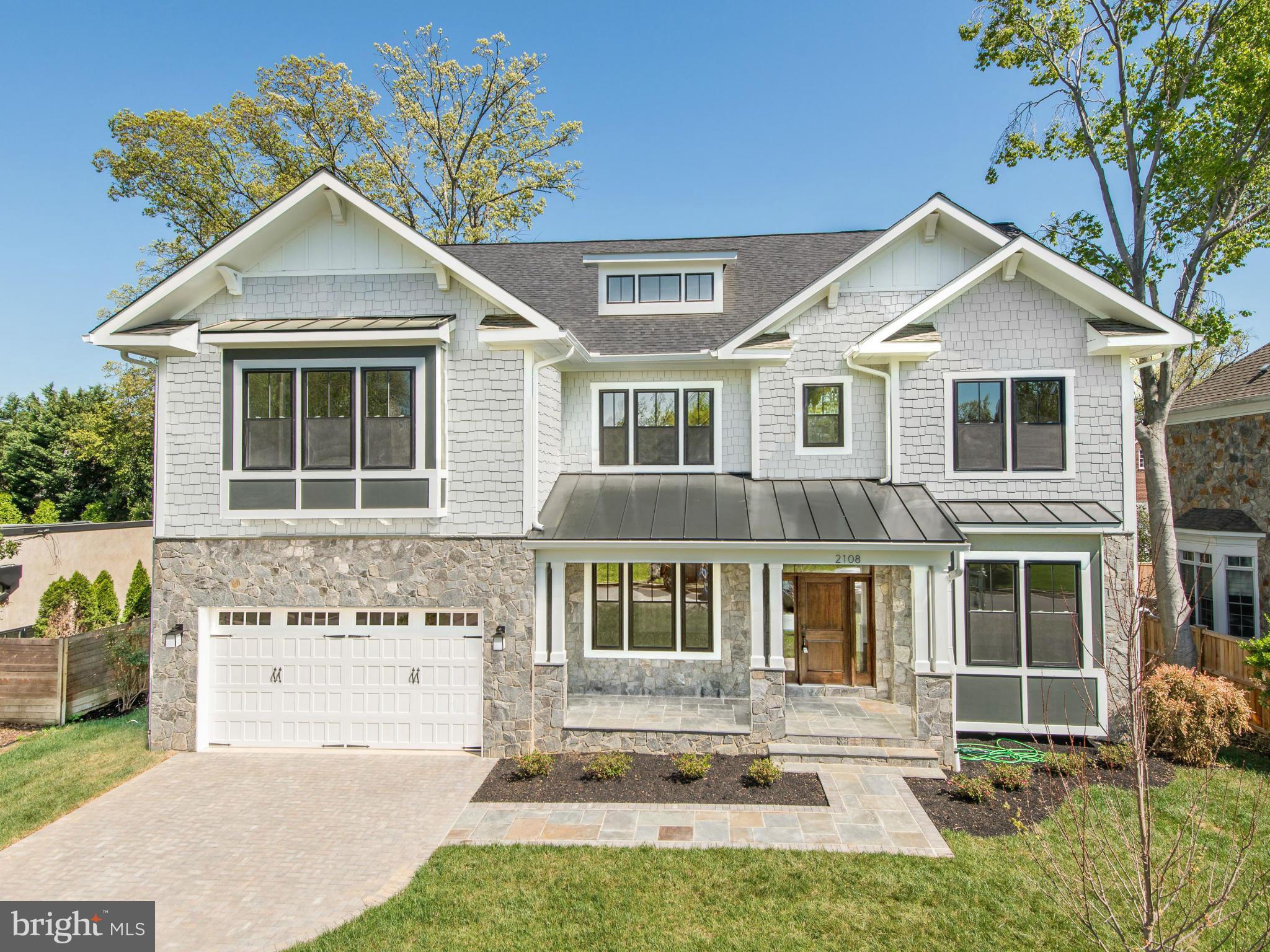 2108 Windsor Road Alexandria, VA 22307 - Photo 1 of 30 a front view of a house with a yard
