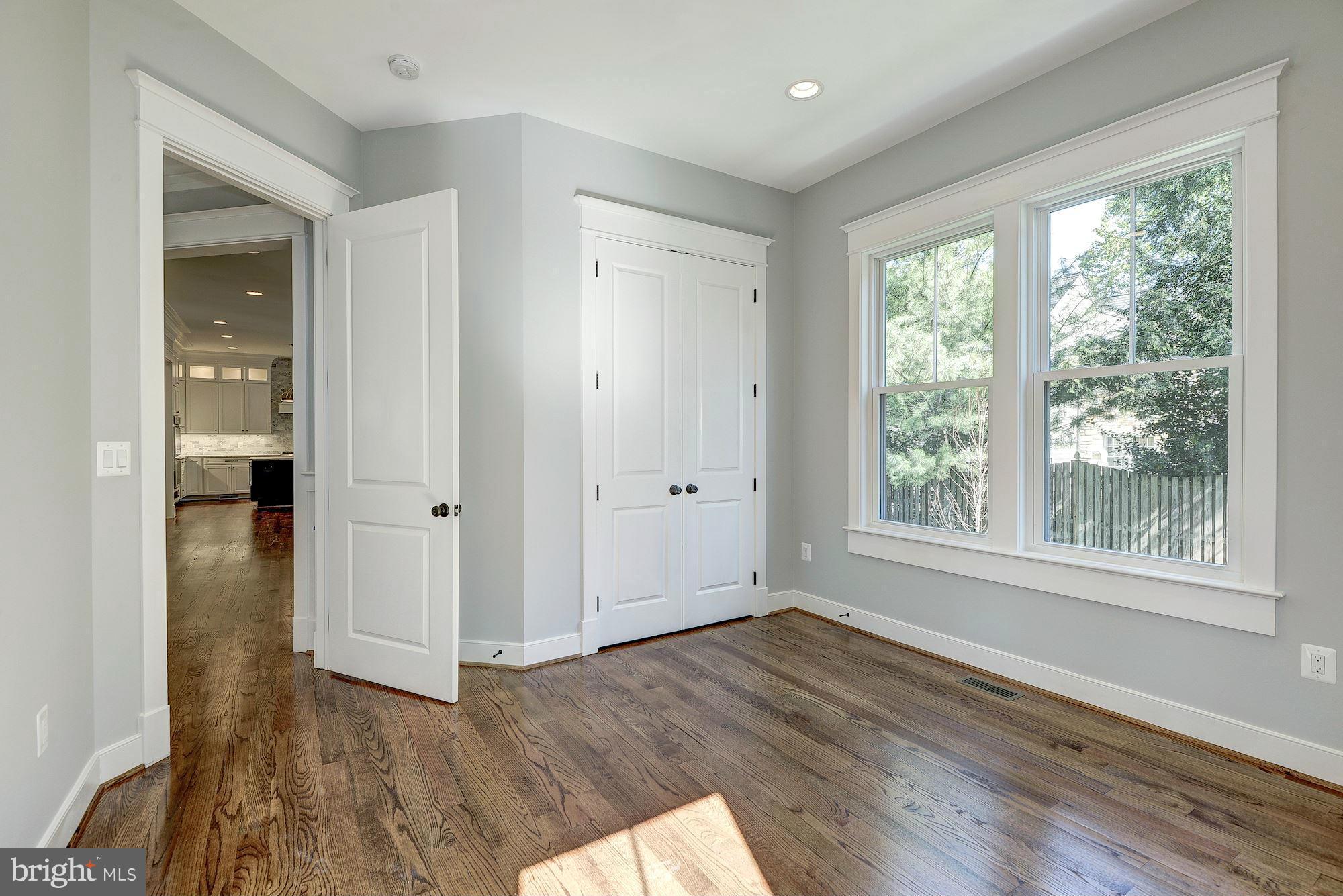 2108 Windsor Road Alexandria, VA 22307 - Photo 17 of 30 wooden floor in an empty room with a window