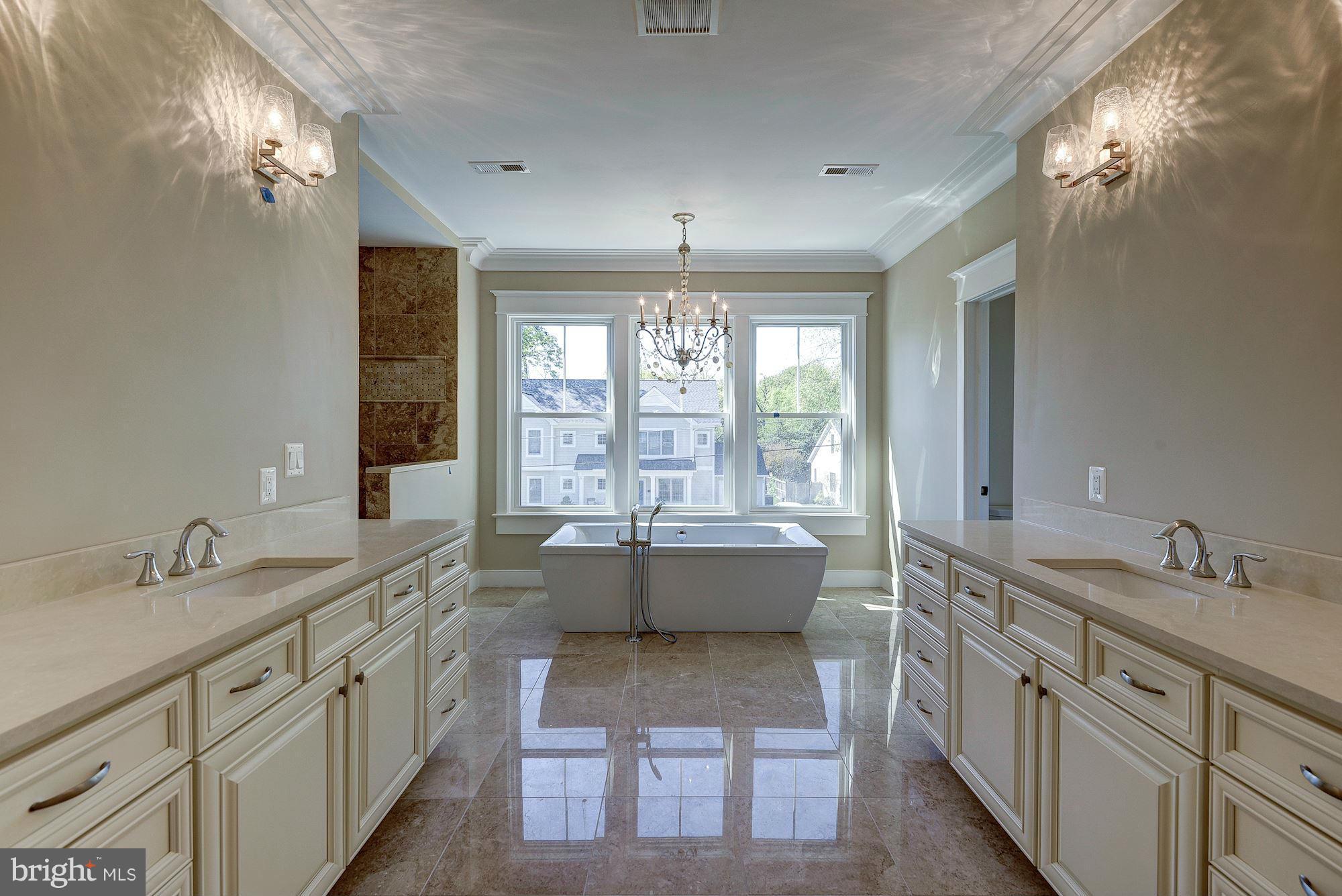 2108 Windsor Road Alexandria, VA 22307 - Photo 25 of 30 a large white kitchen with a large window