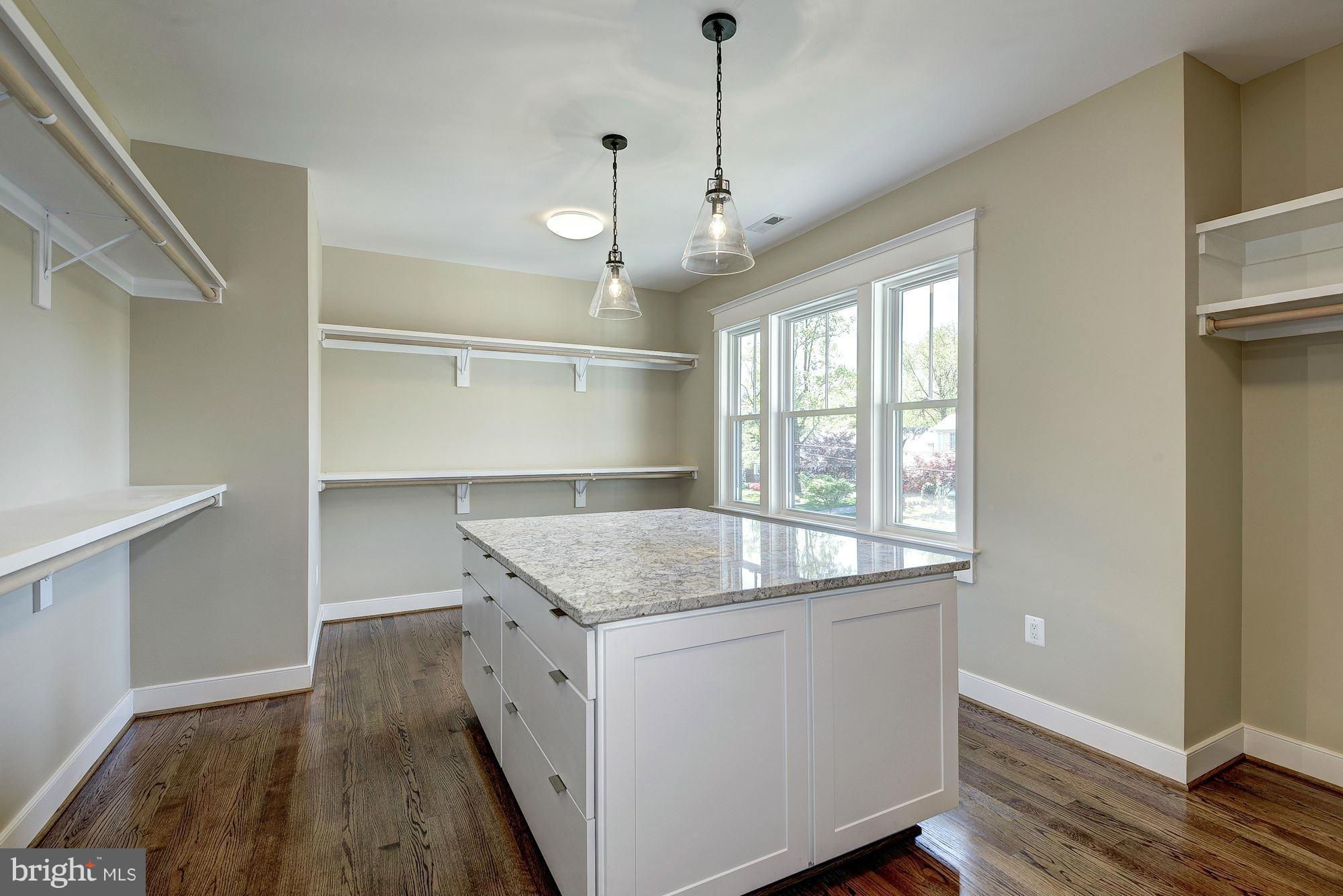 2108 Windsor Road Alexandria, VA 22307 - Photo 28 of 30 a room with wooden floor and window