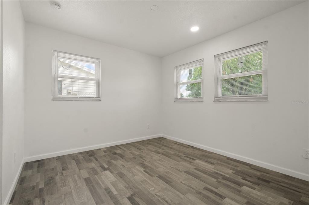 4385 Cassius Street Orlando, FL 32811 - Photo 16 of 21 an empty room with a window