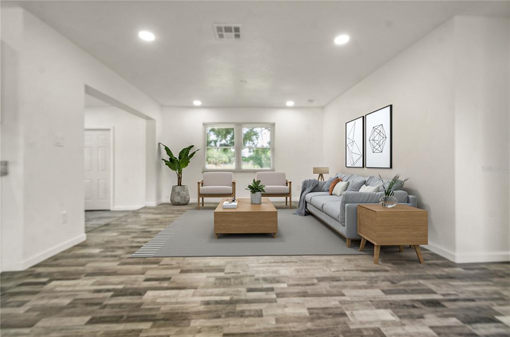 4385 Cassius Street Orlando, FL 32811 - Photo 4 of 21 a living room with furniture and window