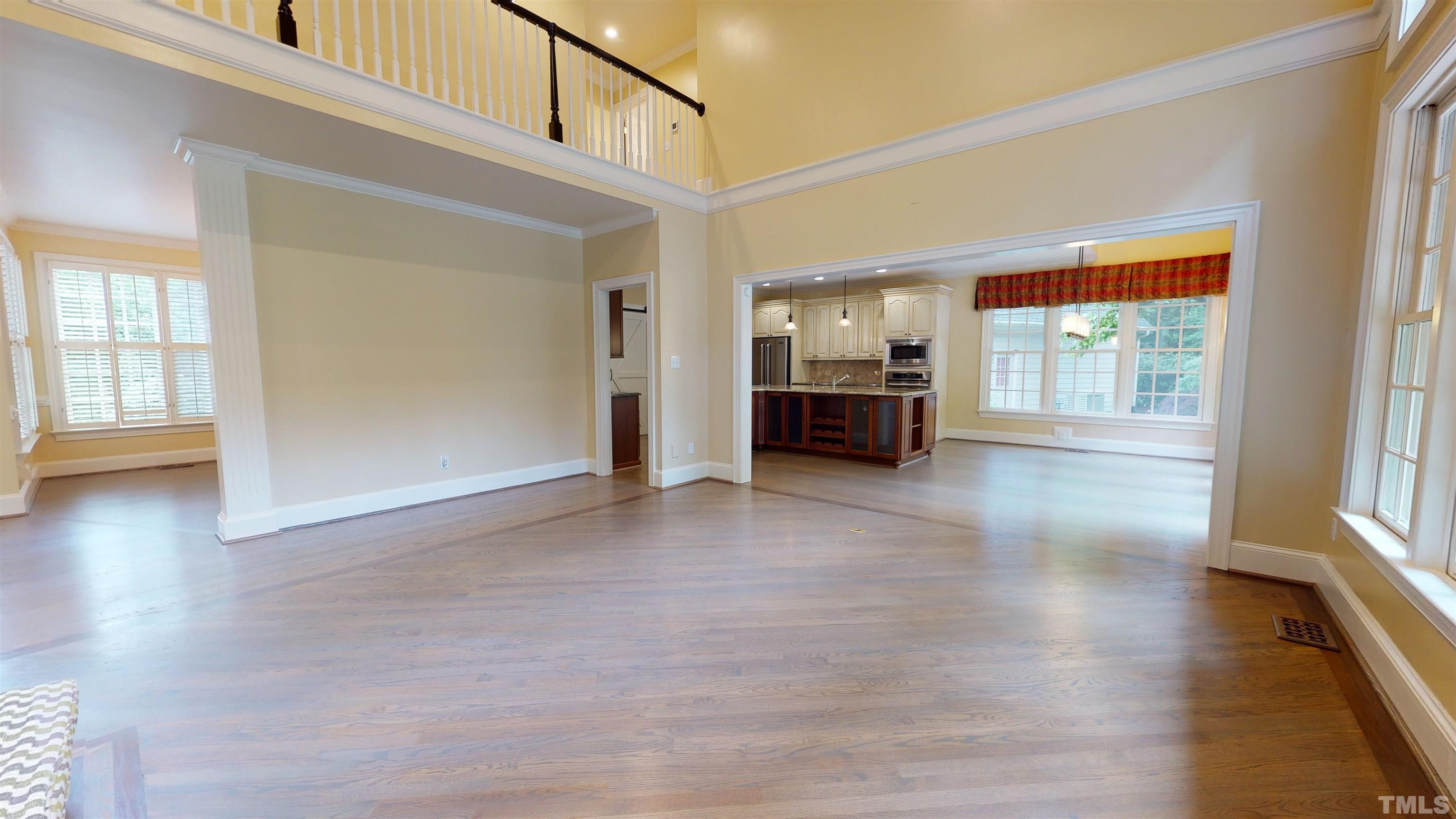1624 Adams Mountain Road Raleigh, NC 27614 - Photo 44 of 100 a view of a livingroom with furniture window and wooden floor