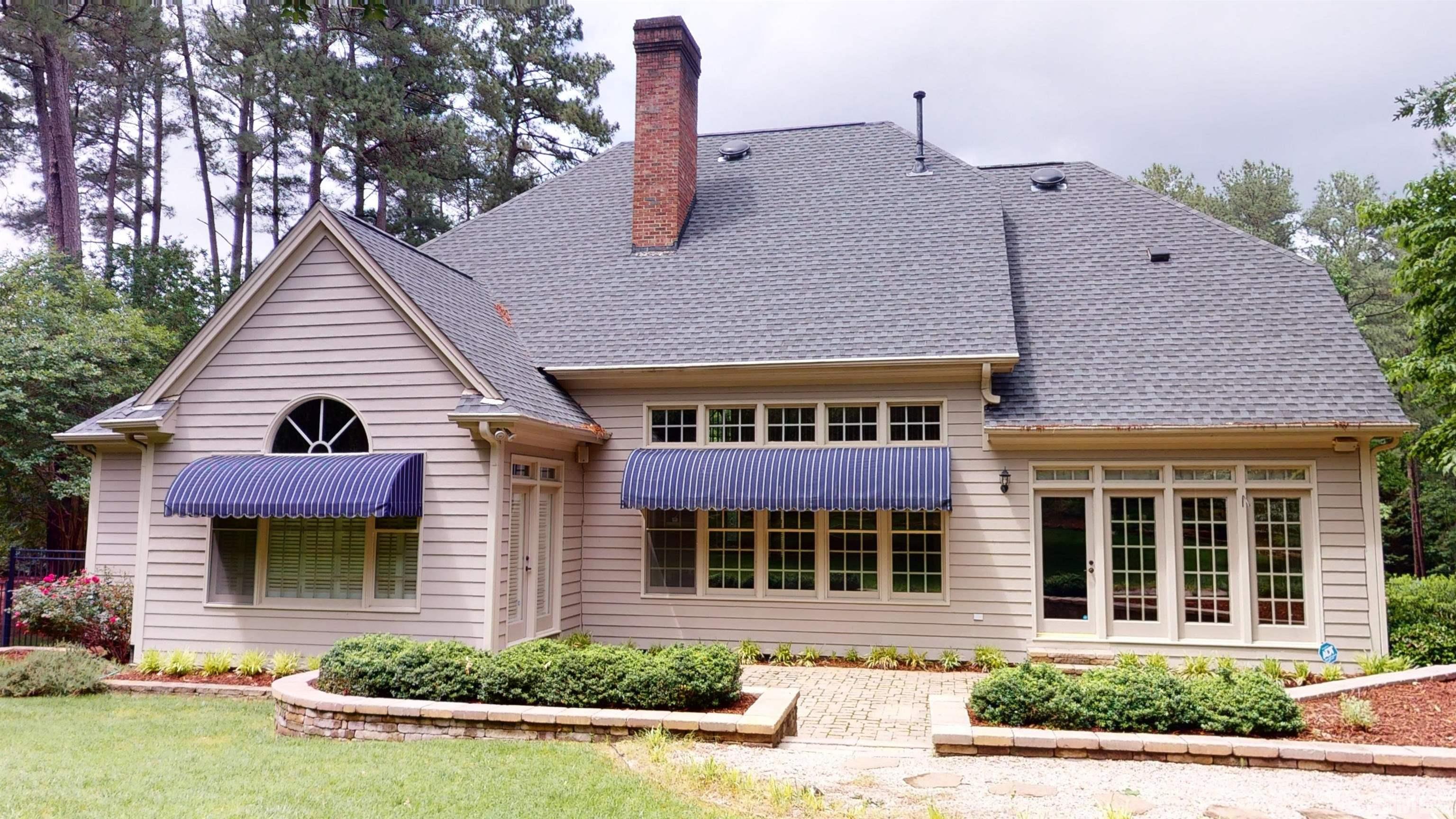 1624 Adams Mountain Road Raleigh, NC 27614 - Photo 5 of 100 a front view of a house with a yard