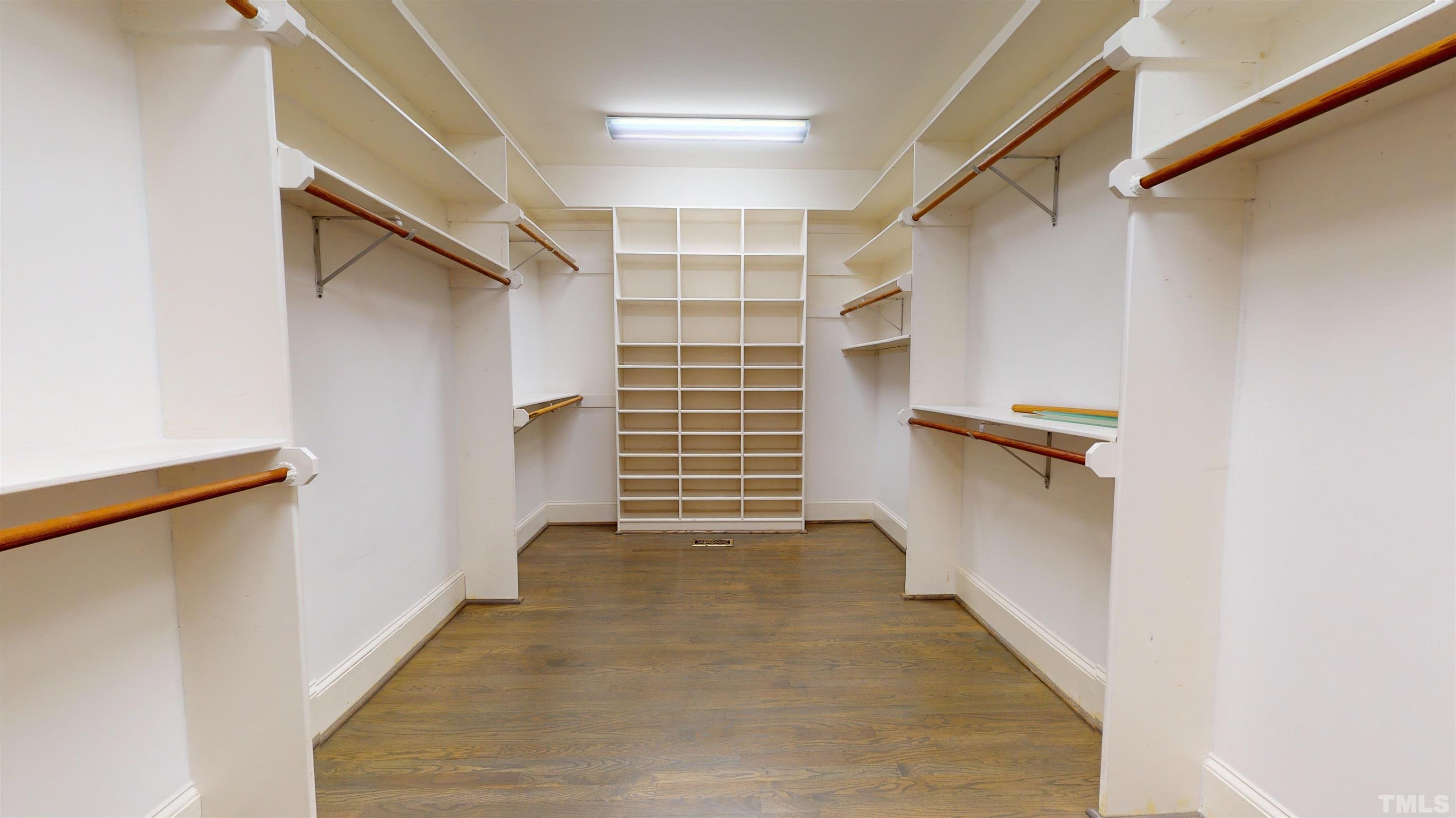 1624 Adams Mountain Road Raleigh, NC 27614 - Photo 56 of 100 a view of walk in closet with empty racks