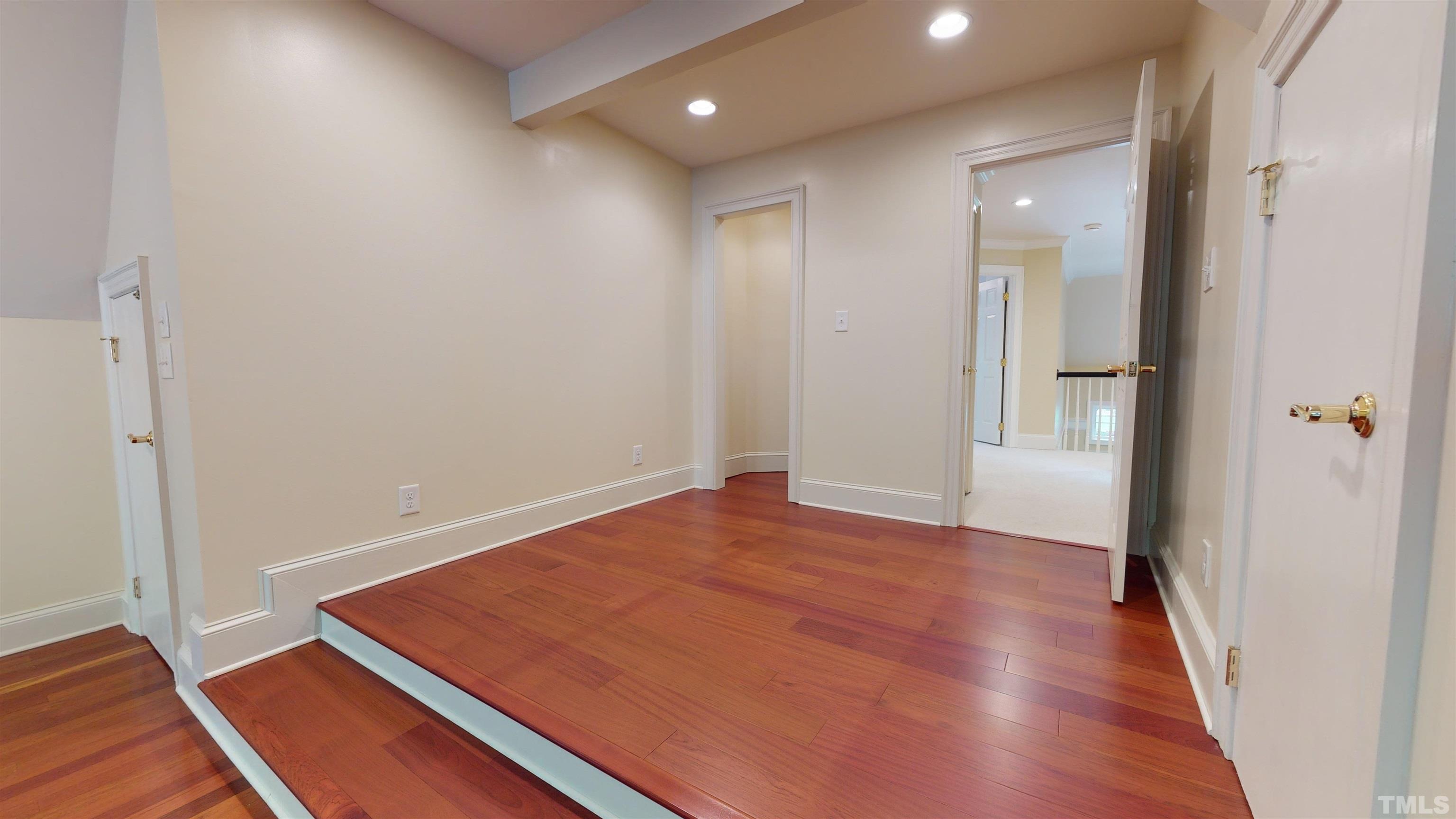 1624 Adams Mountain Road Raleigh, NC 27614 - Photo 64 of 100 a view of room with window and wooden floor