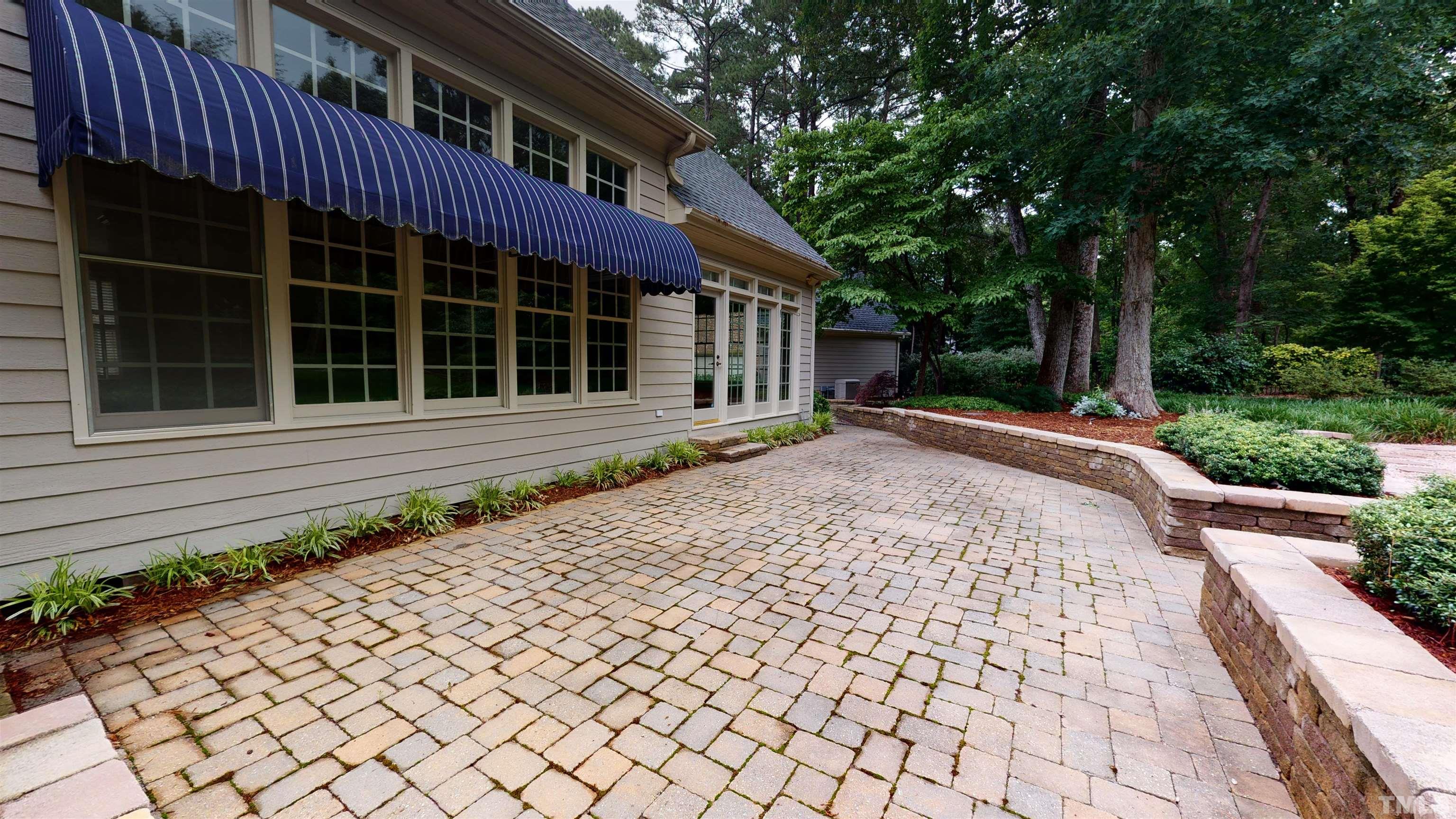 1624 Adams Mountain Road Raleigh, NC 27614 - Photo 86 of 100 a front view of a house with a yard and potted plants