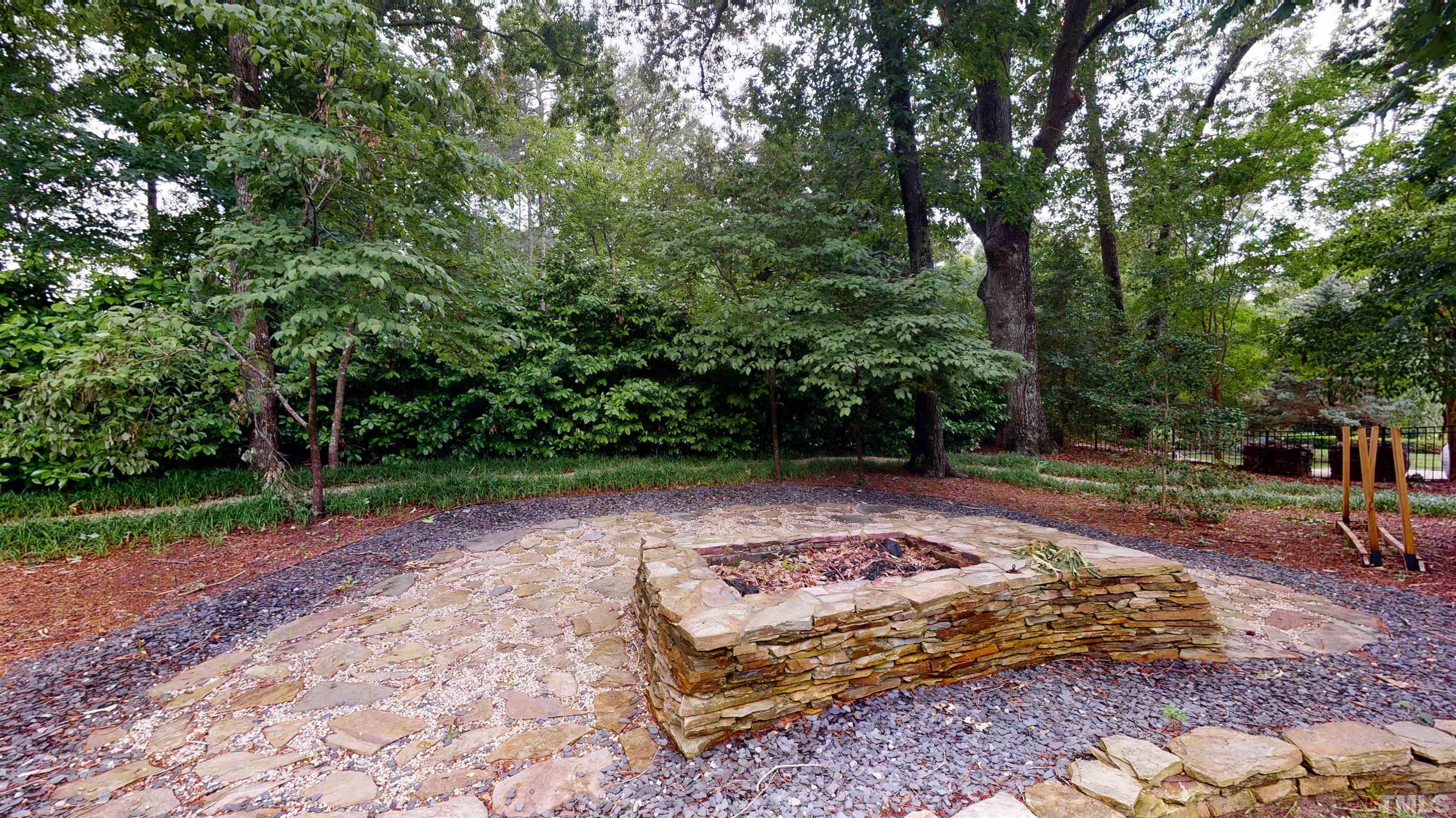 1624 Adams Mountain Road Raleigh, NC 27614 - Photo 92 of 100 a view of a backyard with large trees