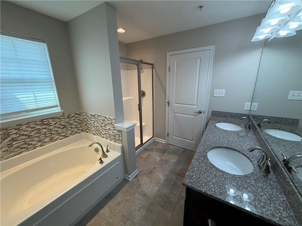 202 Pointe View Drive Mars, PA 16046 - Photo 5 of 10 a bathroom with a granite countertop sink and a mirror