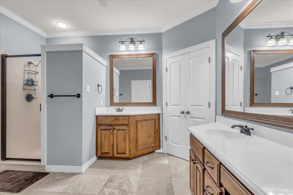 1865 Austin Hines Drive China Spring, TX 76633 - Photo 18 of 30 a spacious bathroom with a double vanity sink mirror and