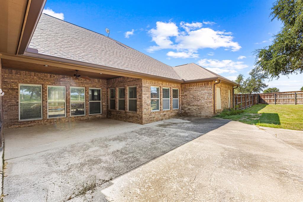 1865 Austin Hines Drive China Spring, TX 76633 - Photo 27 of 30 a view of a house with a patio