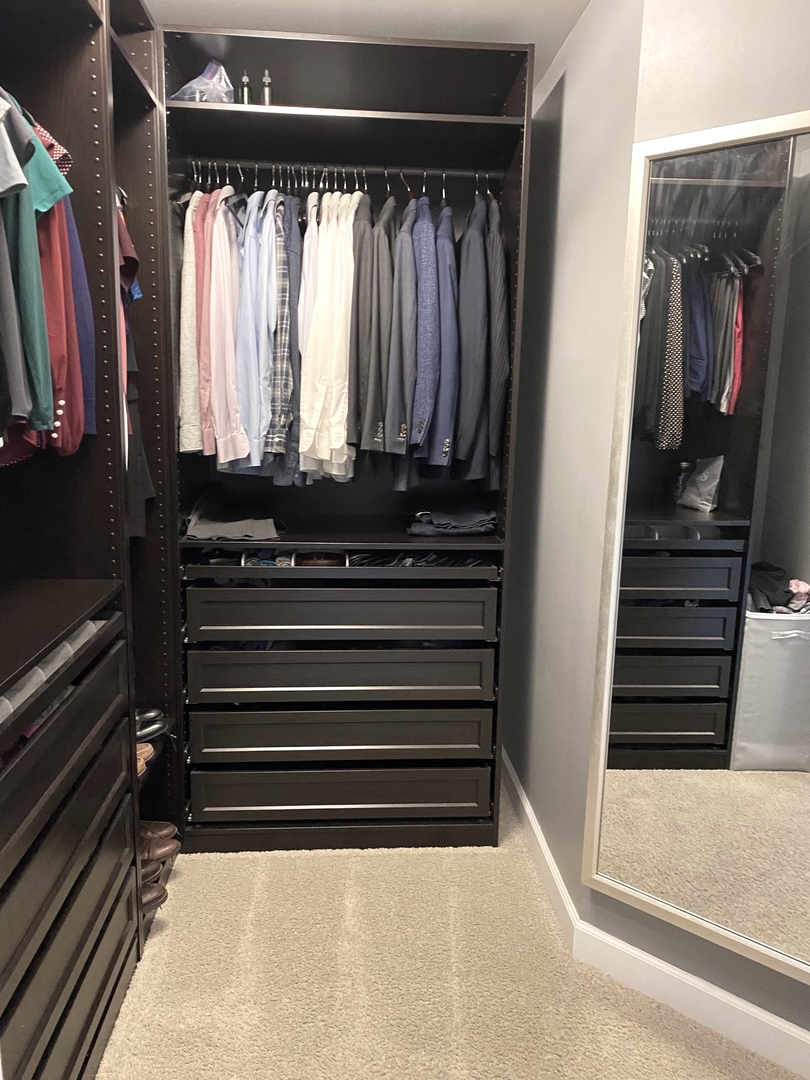 2305 Brookstone Drive Bolingbrook, IL 60490 - Photo 12 of 26 a view of a closet with wooden floor
