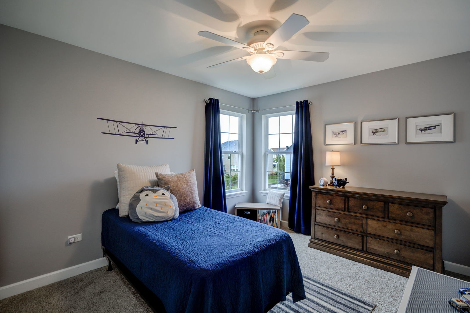 2305 Brookstone Drive Bolingbrook, IL 60490 - Photo 15 of 26 a bedroom with a bed and a chandelier