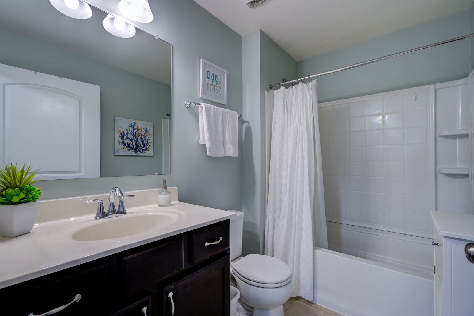 2305 Brookstone Drive Bolingbrook, IL 60490 - Photo 16 of 26 a bathroom with a sink a toilet and shower