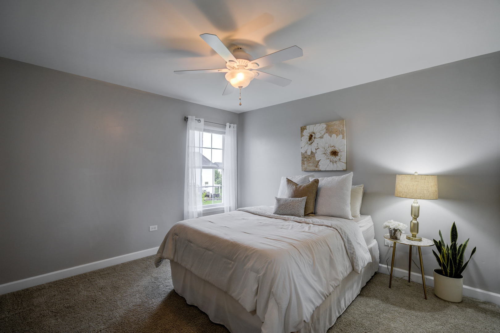 2305 Brookstone Drive Bolingbrook, IL 60490 - Photo 17 of 26 a bedroom with a bed and window