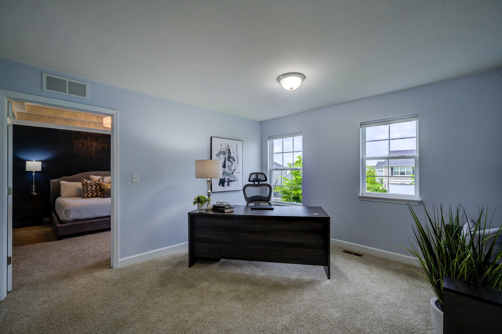 2305 Brookstone Drive Bolingbrook, IL 60490 - Photo 18 of 26 a bedroom with furniture and a window