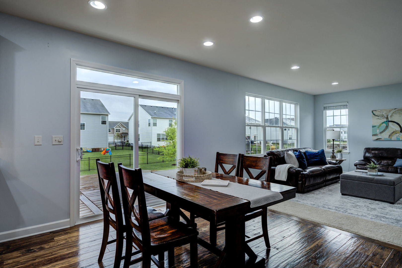 2305 Brookstone Drive Bolingbrook, IL 60490 - Photo 5 of 26 a view of a dining room with furniture window and wooden floor
