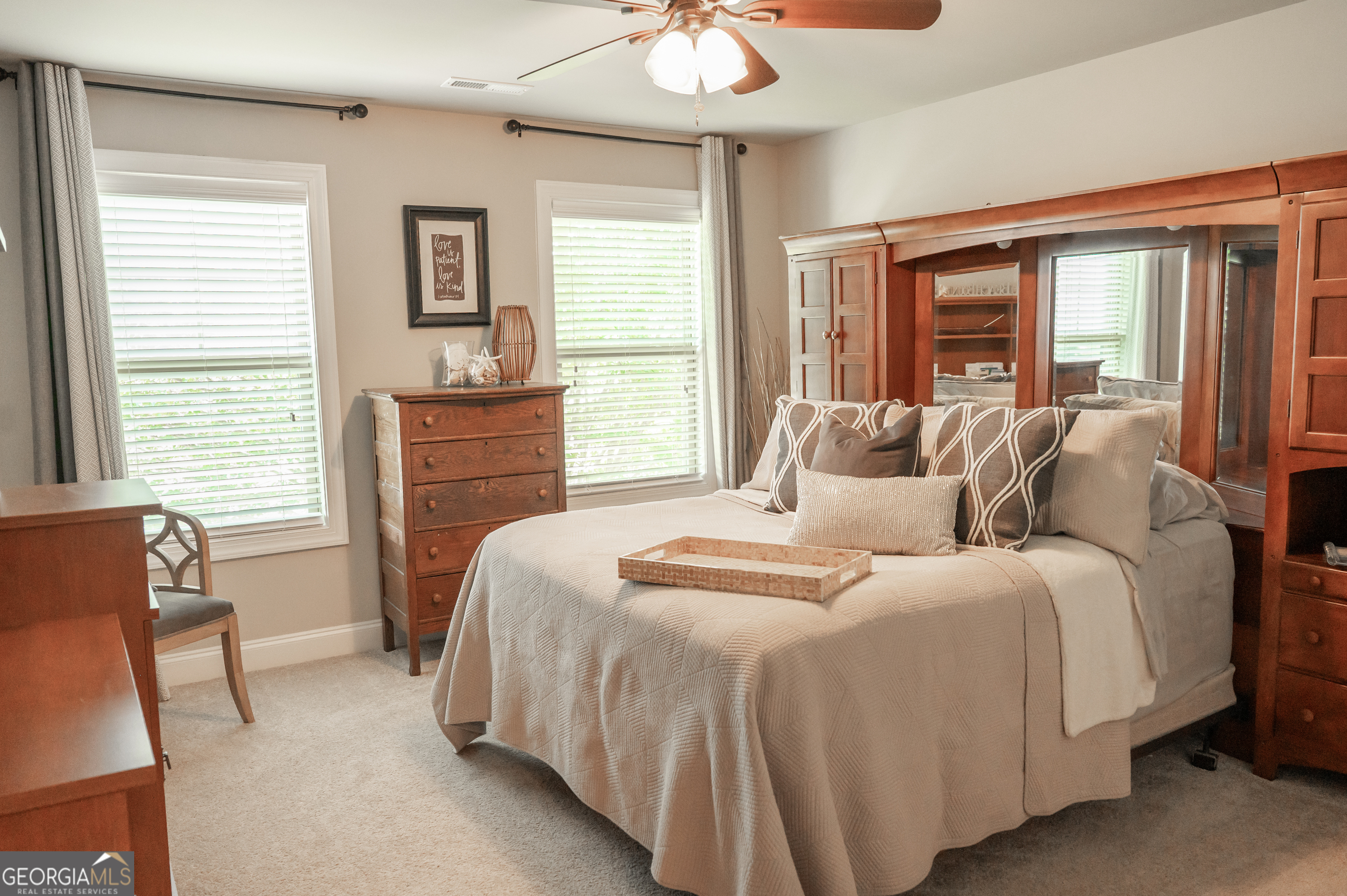 415 EAS Way Fayetteville, GA 30215 - Photo 38 of 70 a bedroom with a bed and a chair