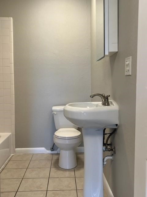 1504 Freeman Street Houston, TX 77009 - Photo 7 of 20 a bathroom with a sink a toilet and mirror